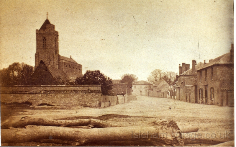 1873 trees felled.jpg - Church Street looking East. The village green in 1863. High Street Baptist manse is first on the right. The small thatched build in the centre is the "Cage", where drunks were locked up until sober.